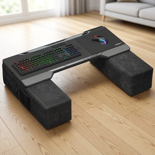 Large black gaming lap desk with padded supports, keyboard, and glowing RGB light bar.