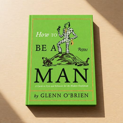 Green guide book titled How To Be A Man, featuring a vintage illustration of a gentleman.