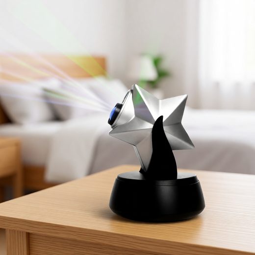 Star-shaped night sky projector with a black base emitting light beams in a bedroom.