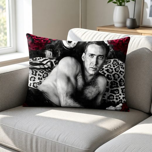Throw pillowcase featuring a black and white portrait of Nicolas Cage framed by leopard print pattern
