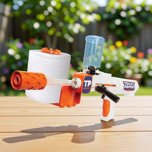 Backyard toy blaster featuring a toilet paper roll and clear firing cup on a wooden surface